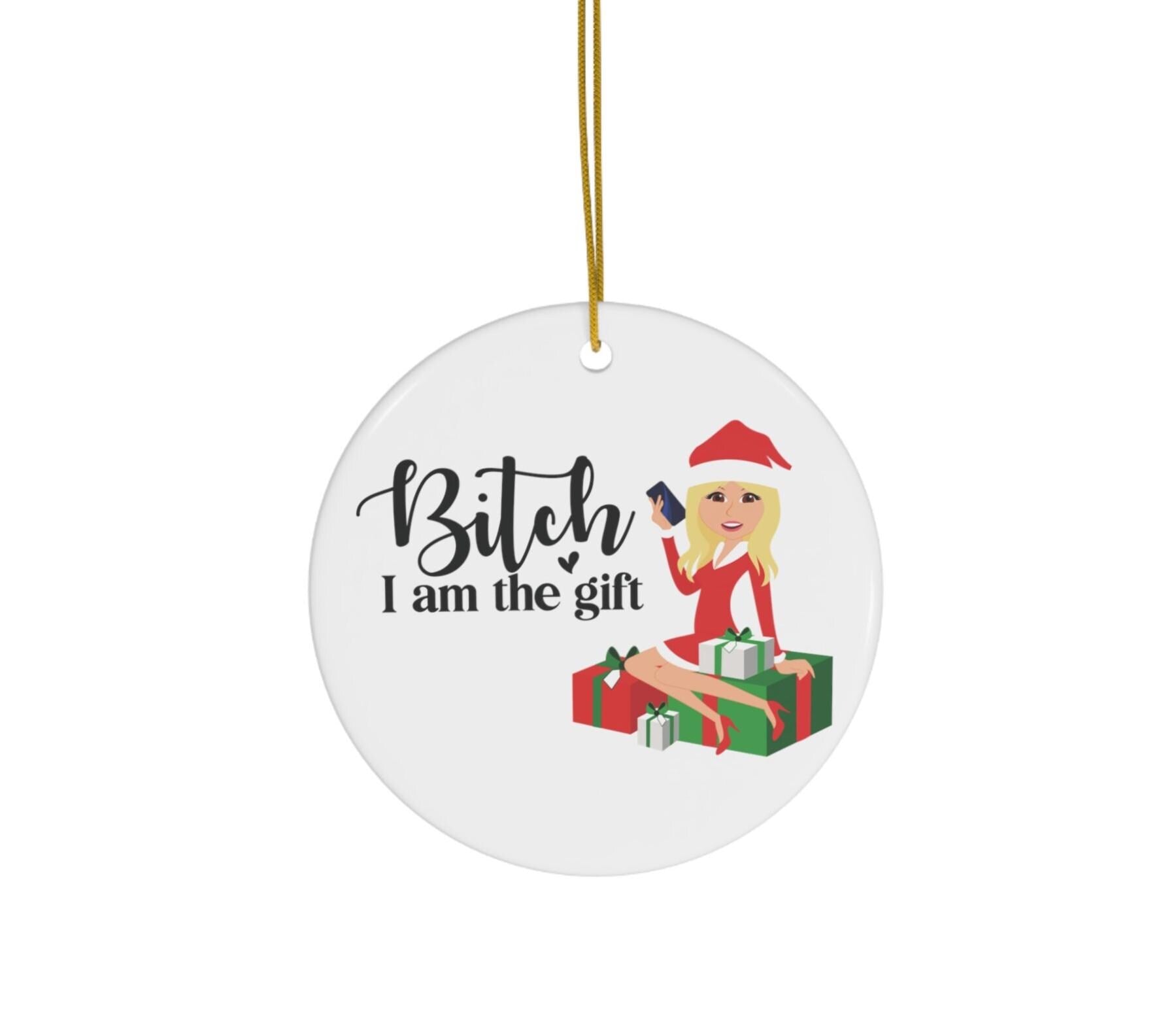Decorative Christmas ornament with text and a graphic of a person in a Santa hat and red outfit.