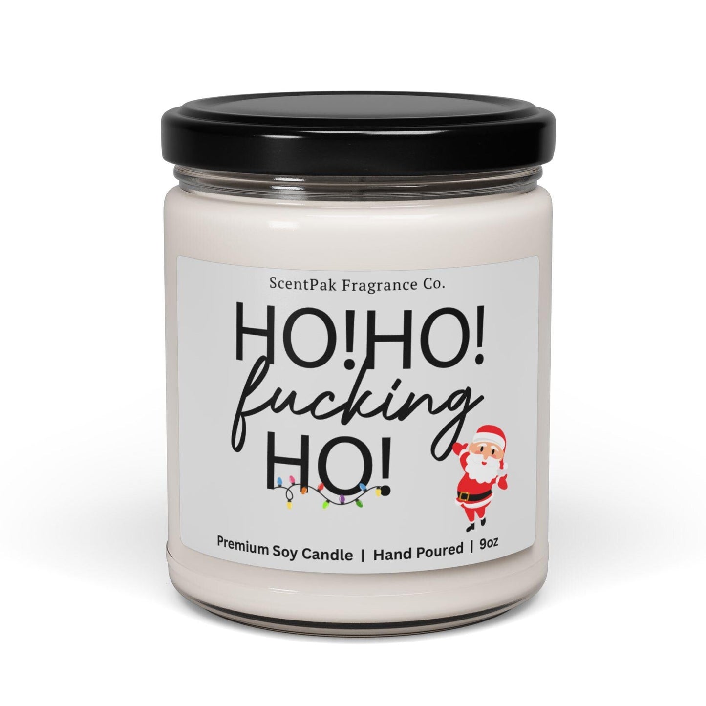 Candle with a humorous label featuring the text 'HO! HO! fucking HO!' on a white background.