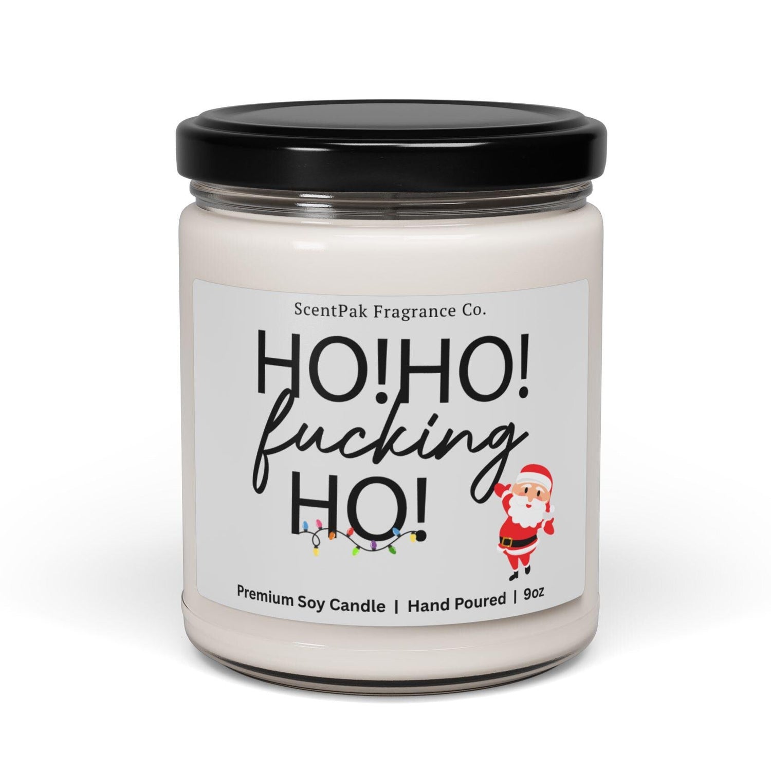Candle with a humorous label featuring the text 'HO! HO! fucking HO!' on a white background.