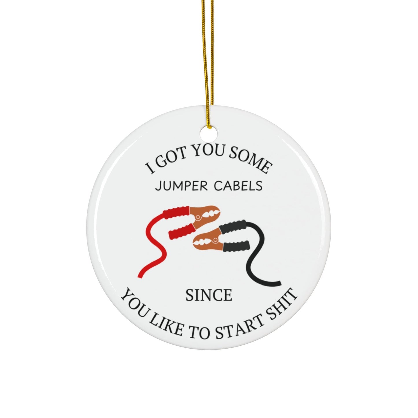 Round white ceramic ornament with jumper cables graphic and text on a white background